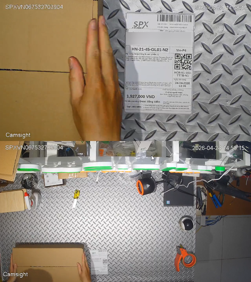 Camera quay đ&oacute;ng h&agrave;ng vừa soi r&otilde; m&atilde; vận đơn vừa quay to&agrave;n cảnh b&agrave;n đ&oacute;ng h&agrave;ng.